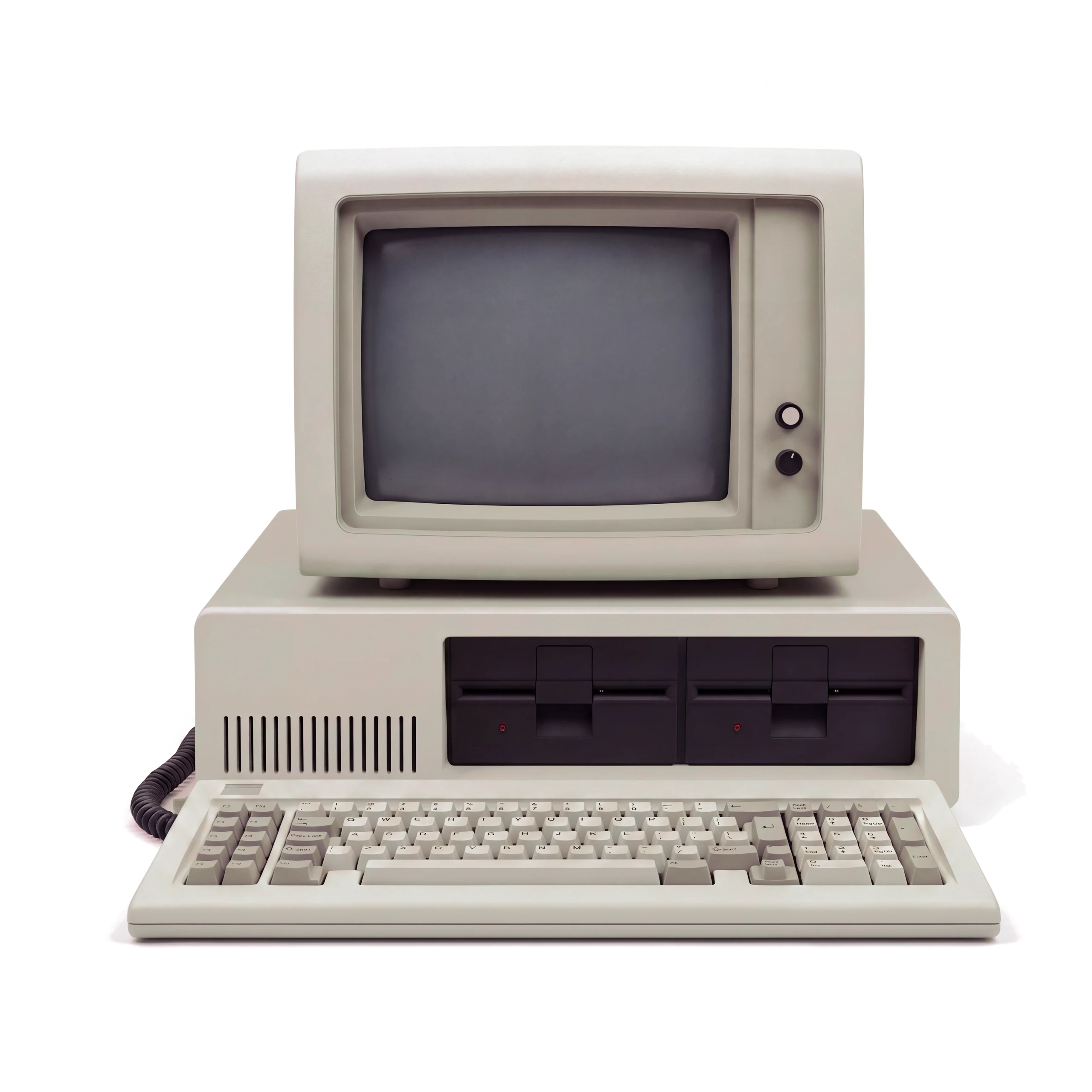An early-1980s personal computer with a monochrome monitor, two floppy drives and a keyboard. On its text-mode screen, the Onroute Intelligence reporting agent is asked “What was our revenue this month?” and answers: “£48,320 invoiced so far in September, up 12% on the same point in August. £6,140 is still unpaid across nine invoices, and three of those are over 30 days.”